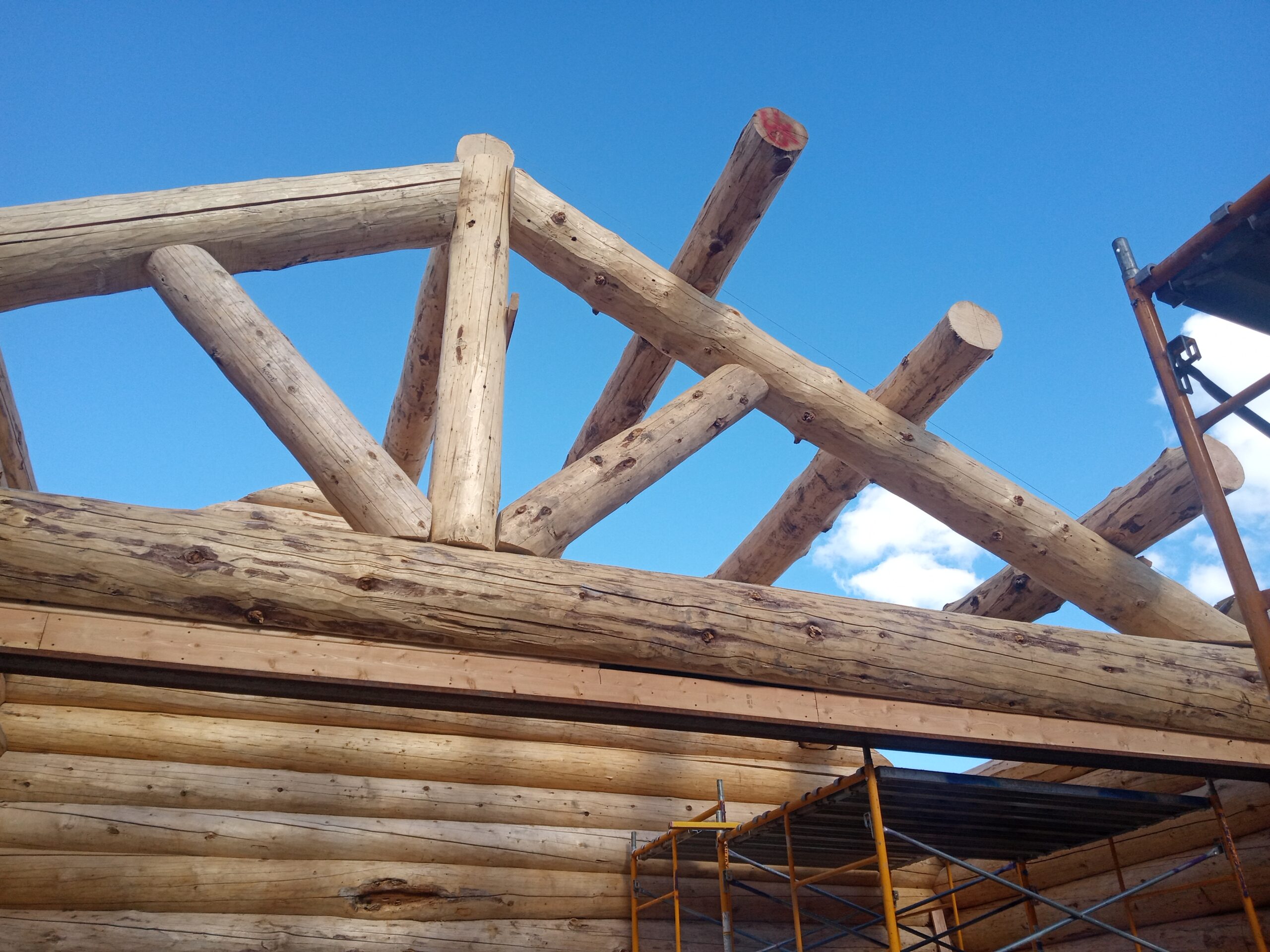 Loft framing inside a handcrafted log home