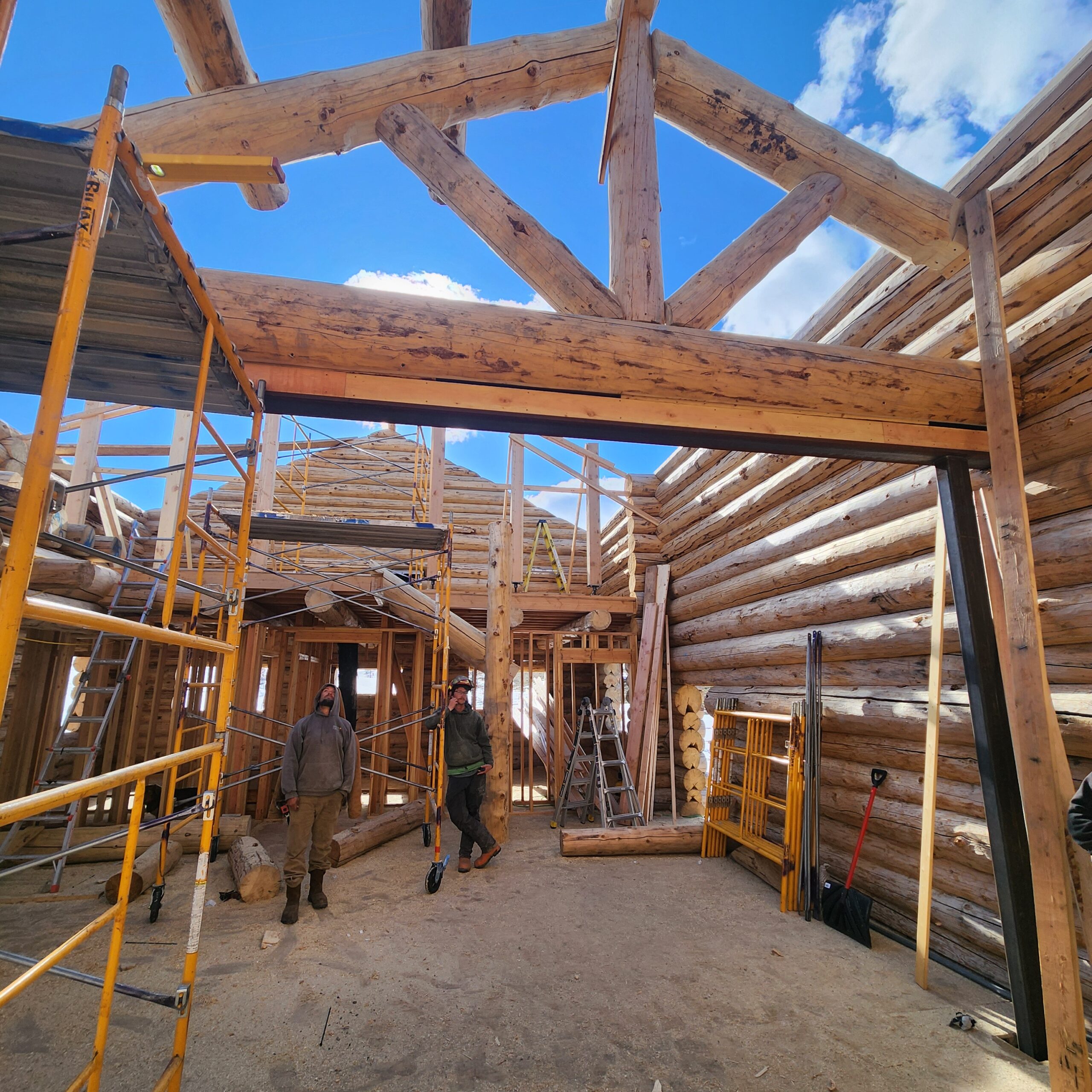 Interior view of handcrafted timber structure during construction