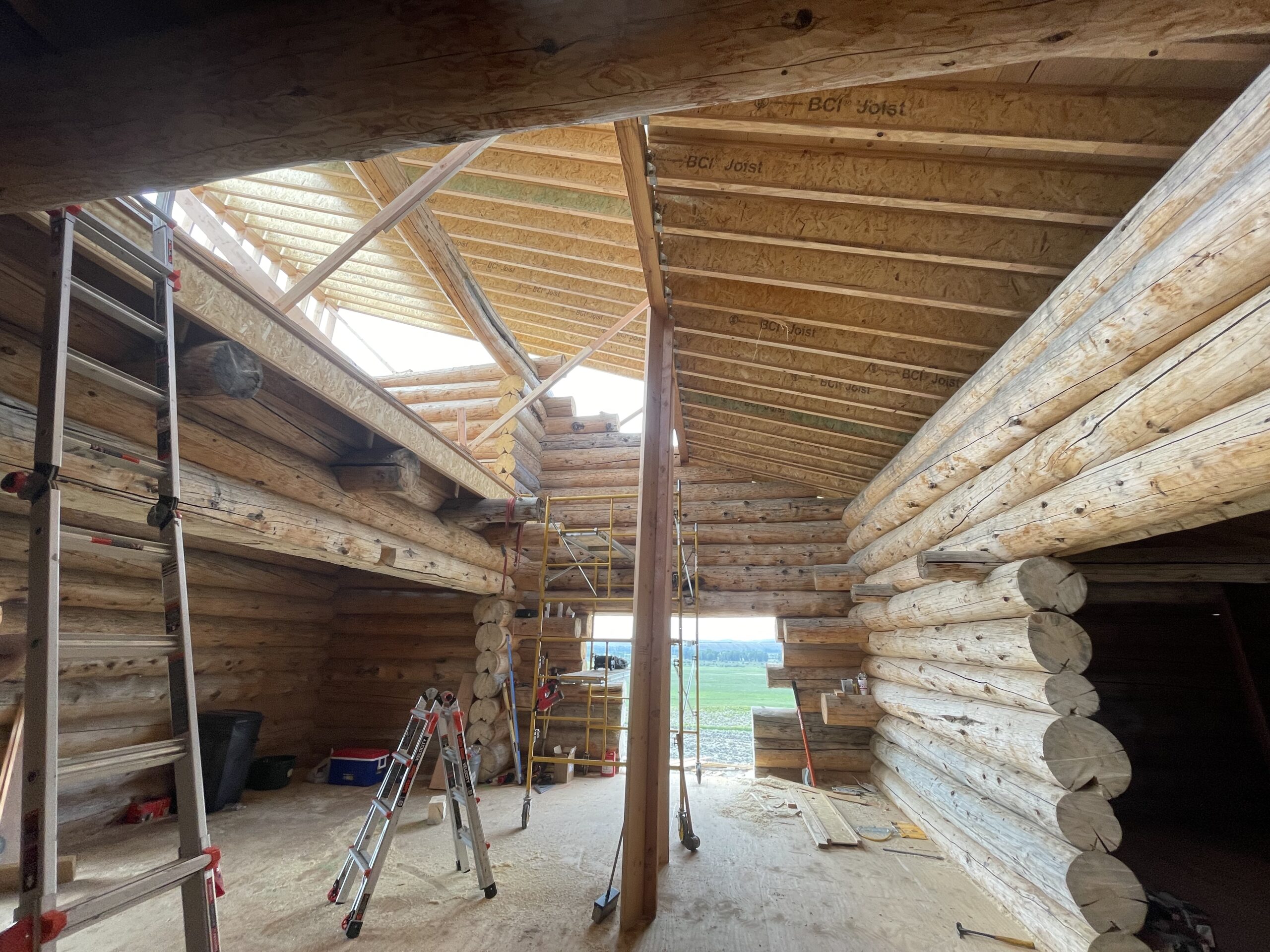 Interior view of stacked log walls on the Burton project