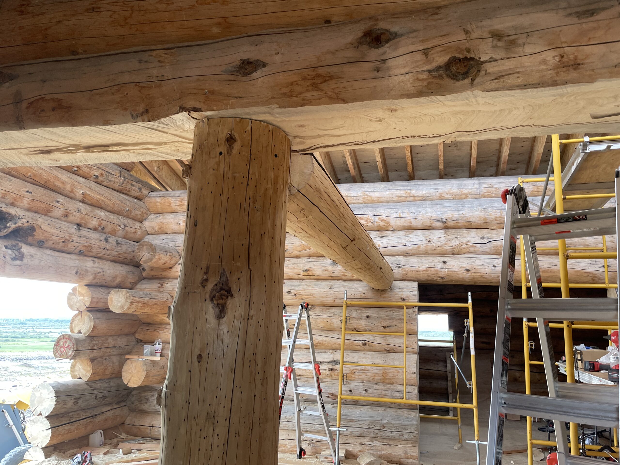 Large post and beam structure inside the Burton handcrafted home