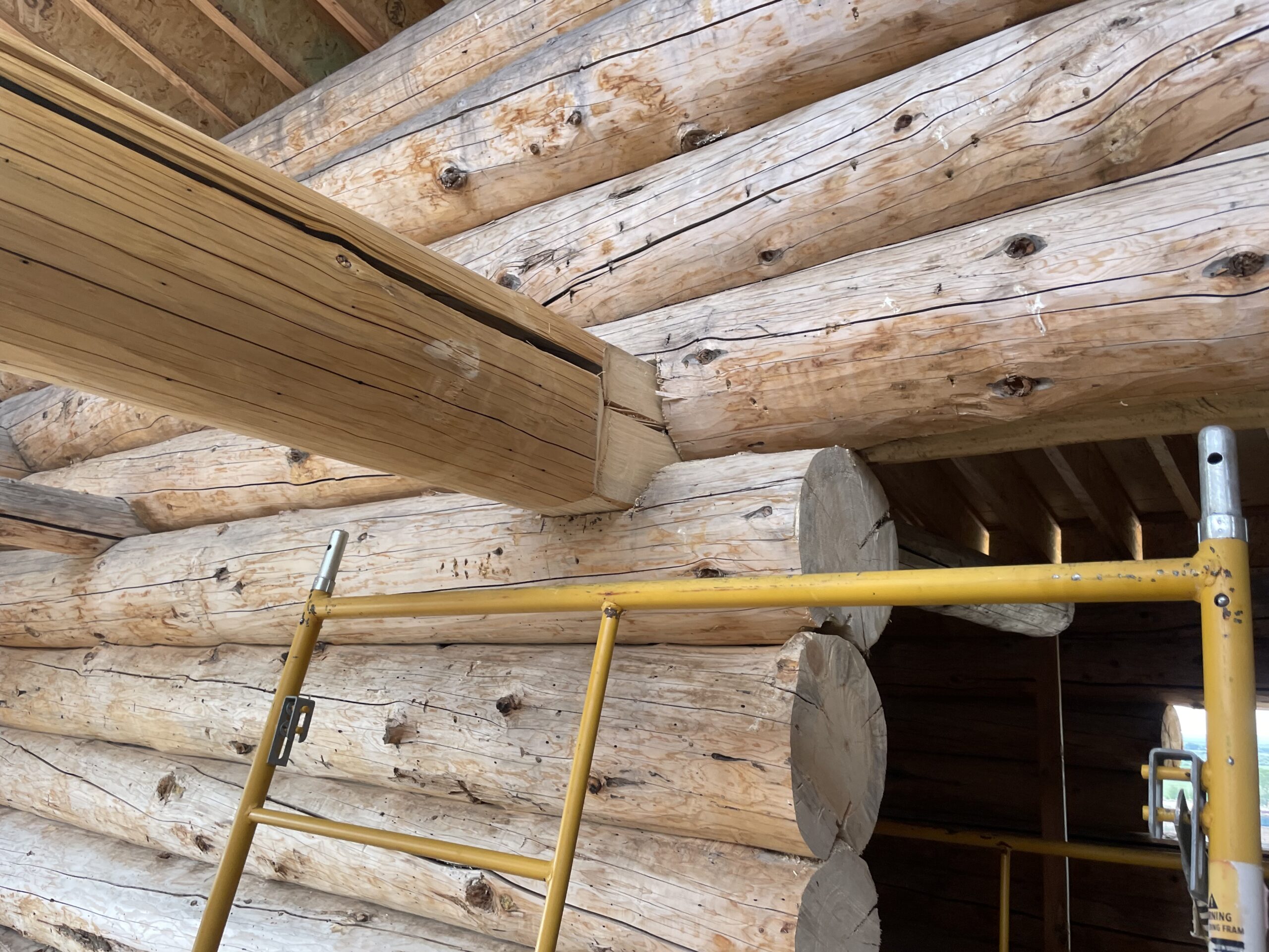 Hand-fitted beam connection in the Burton handcrafted log home