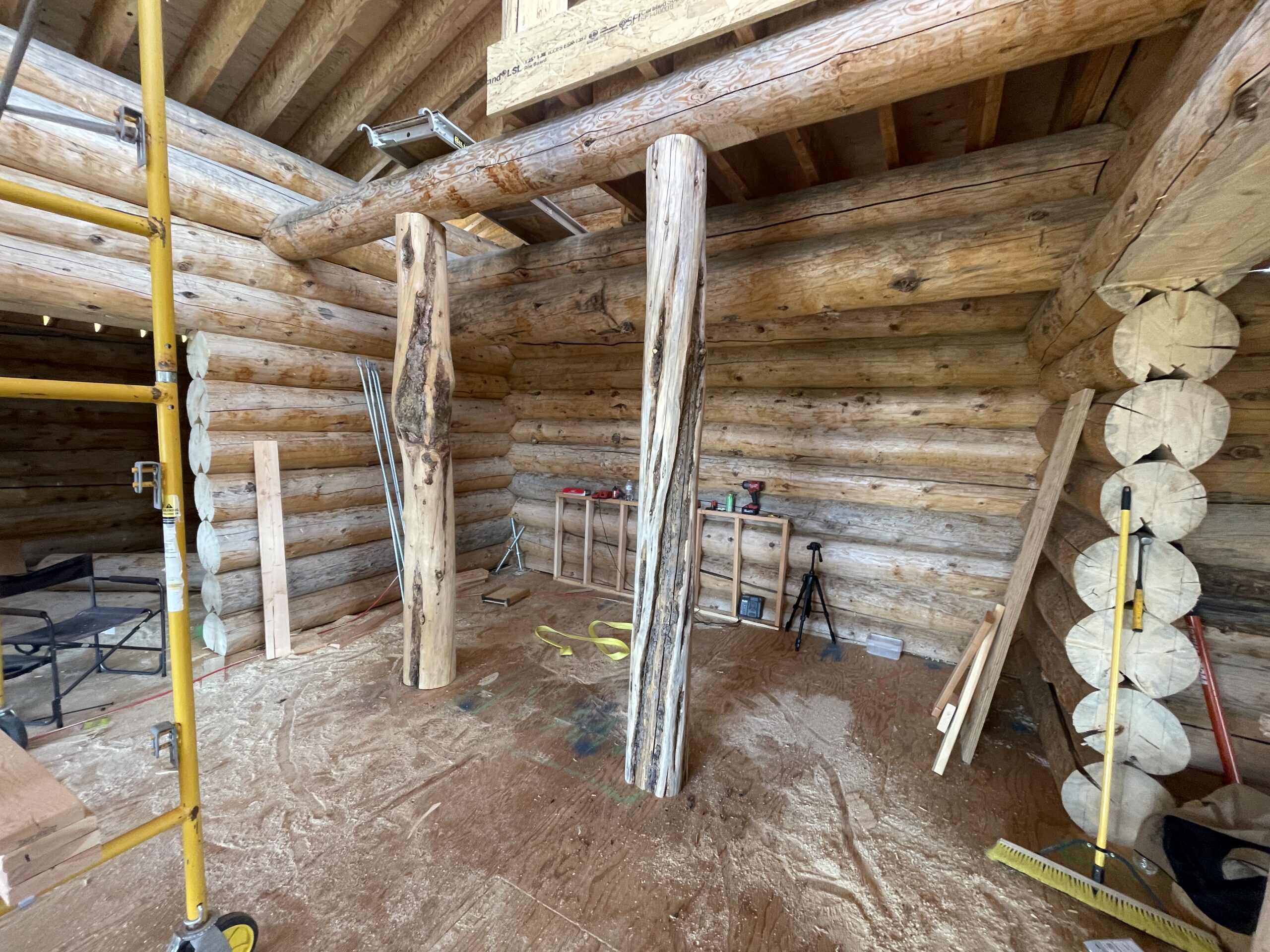Natural log posts inside the Burton handcrafted log home