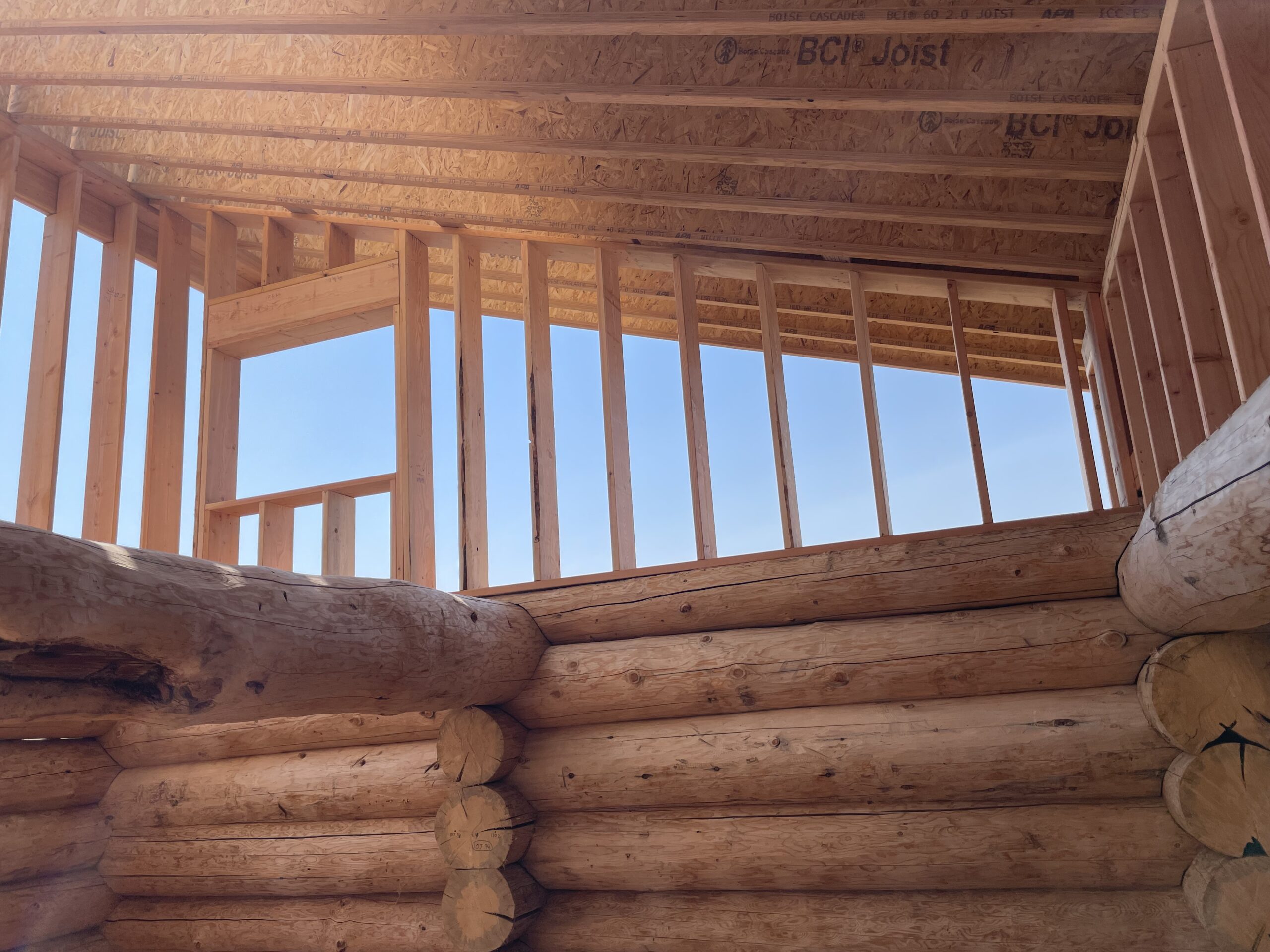 Upper story framing inside the Burton handcrafted log home
