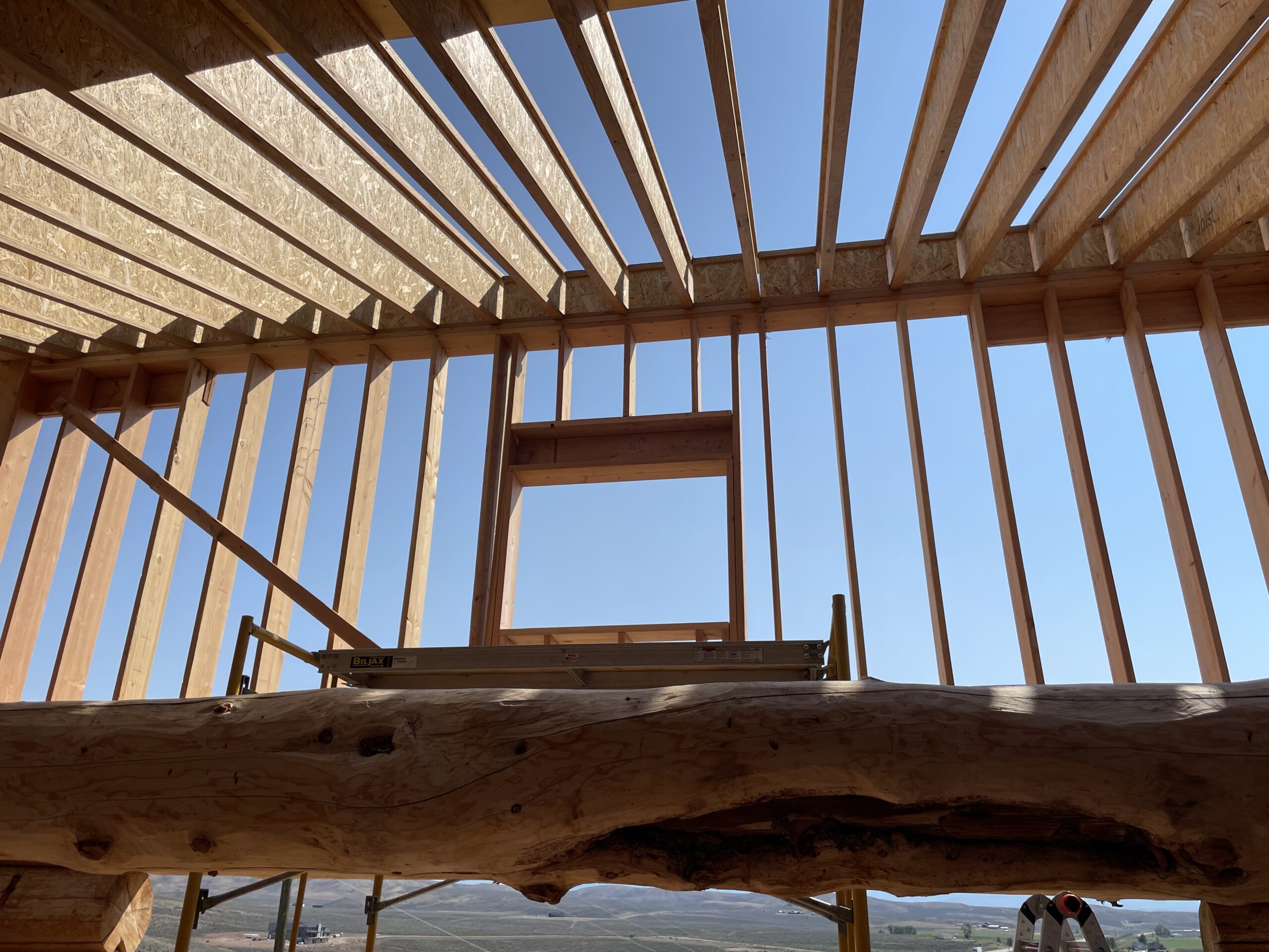 Roof rafters and framed opening above the Burton log walls