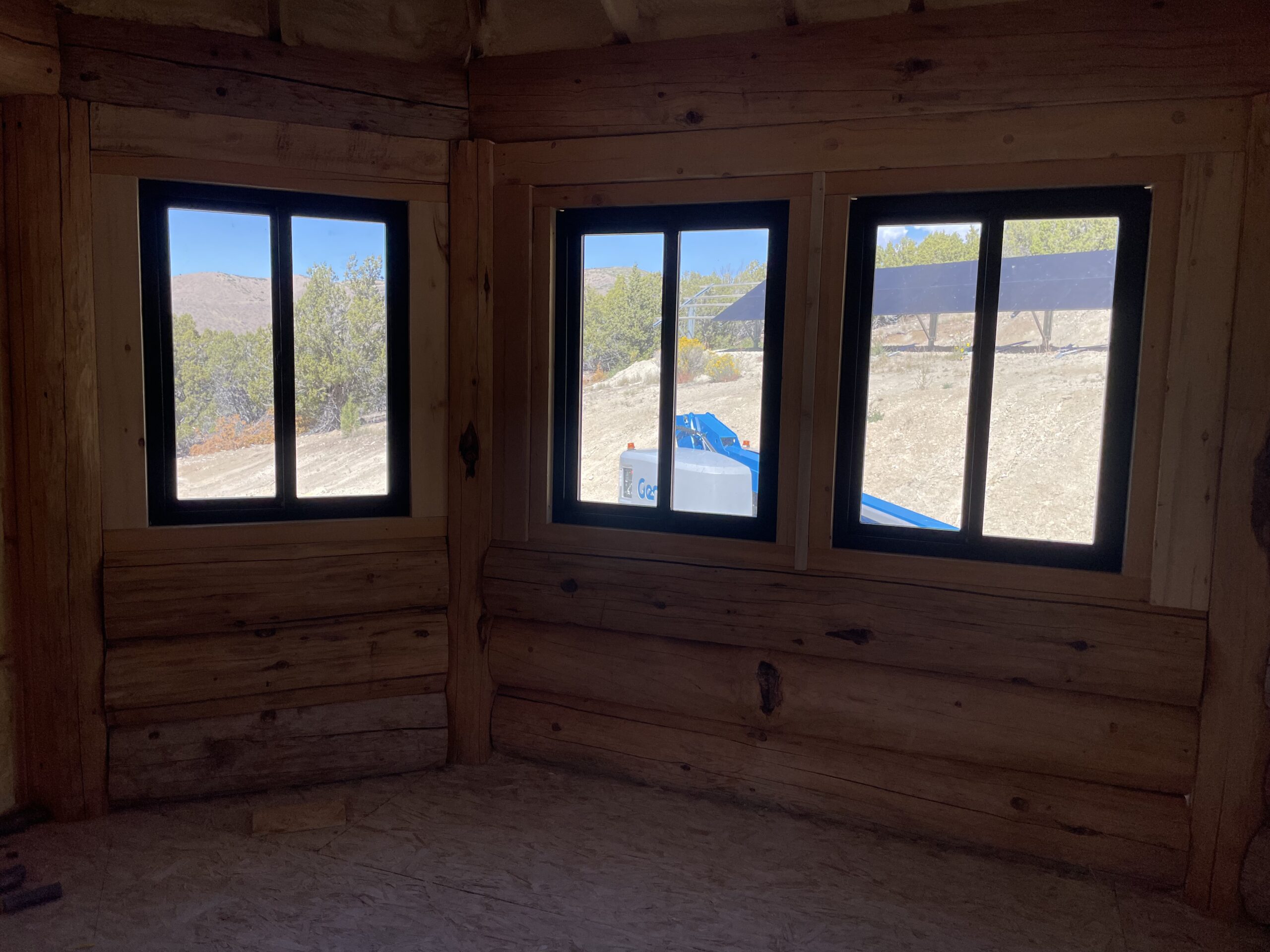 Early structural construction on the Collard's handcrafted log home