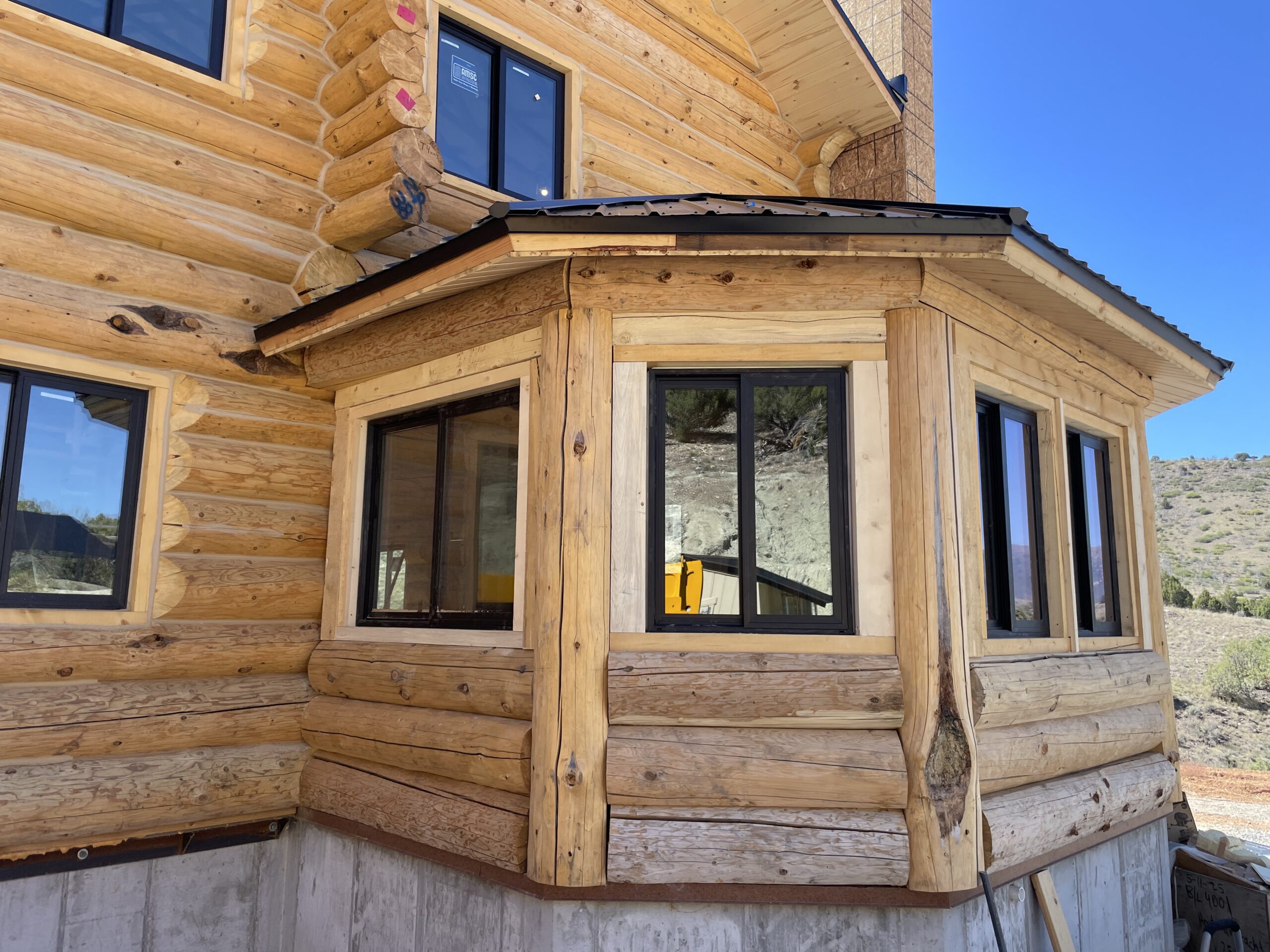Exterior wall and window construction on the Collard's log home