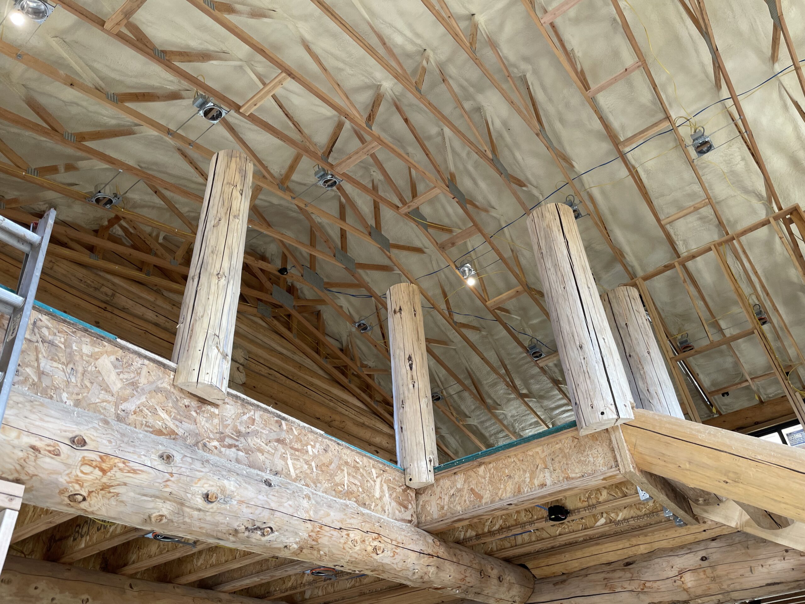 Great room log structure inside the Collard's project