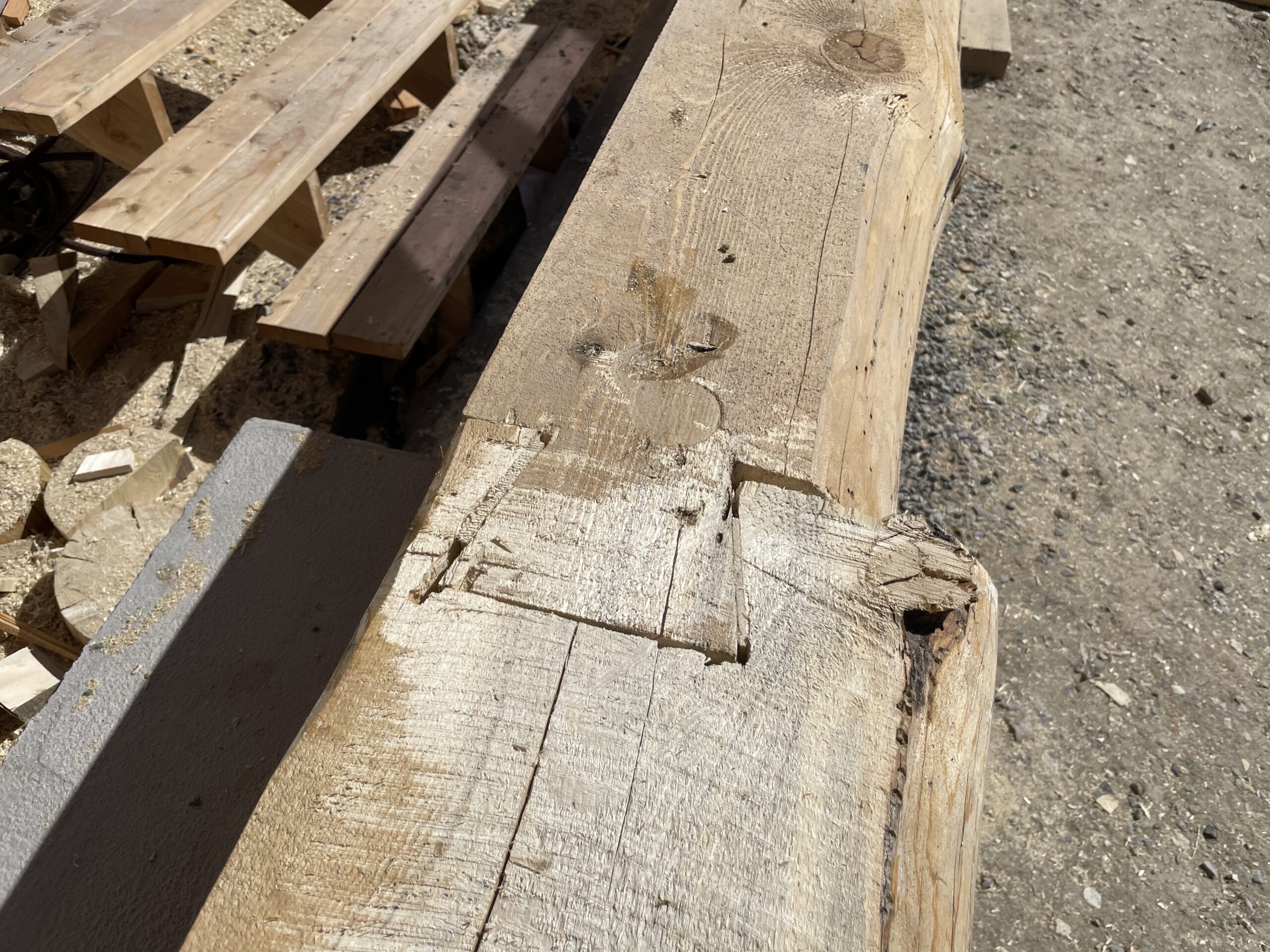 Close-up handcrafted log fitting detail on the Collard's project